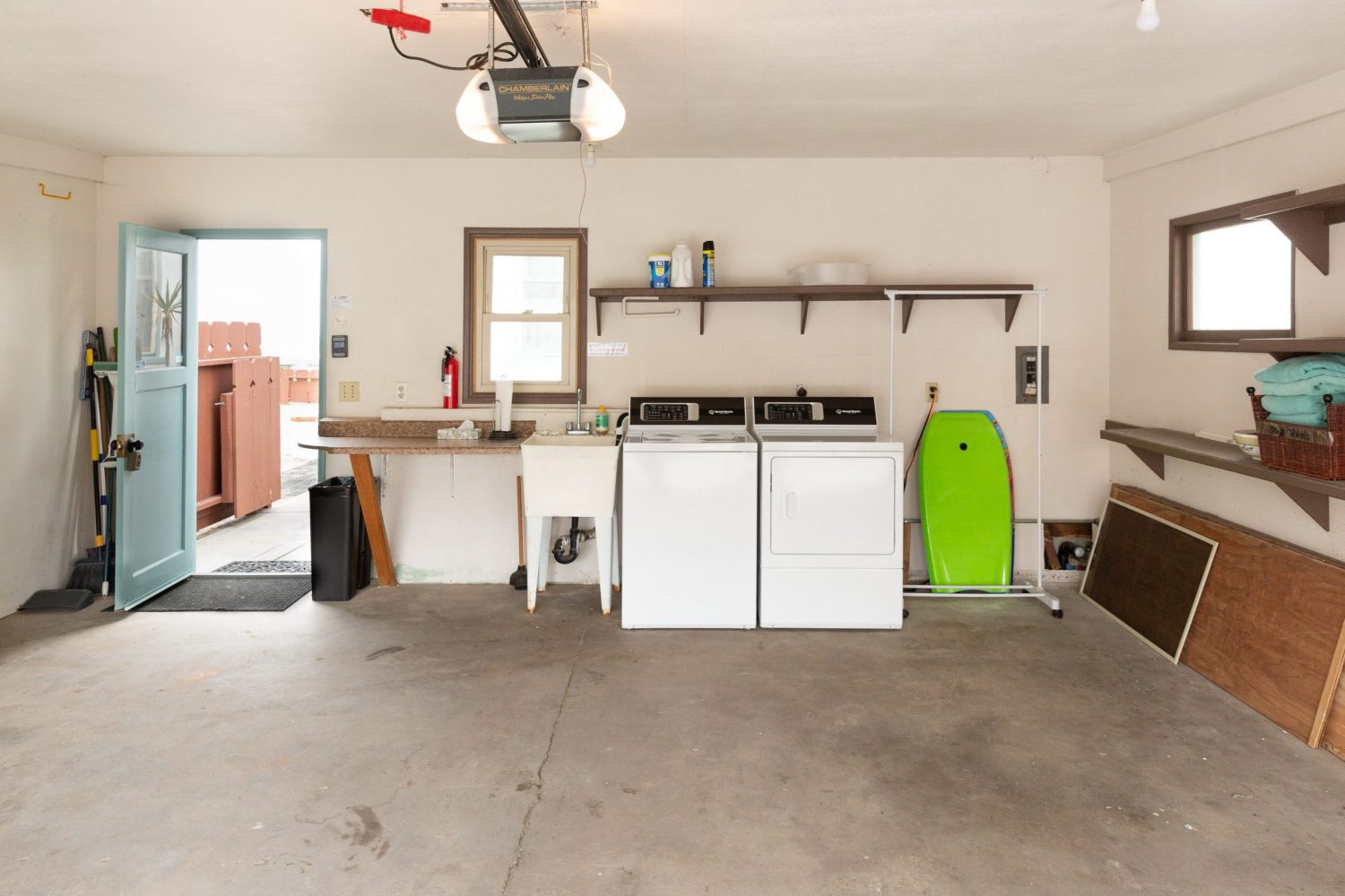 garage with washer and dryer